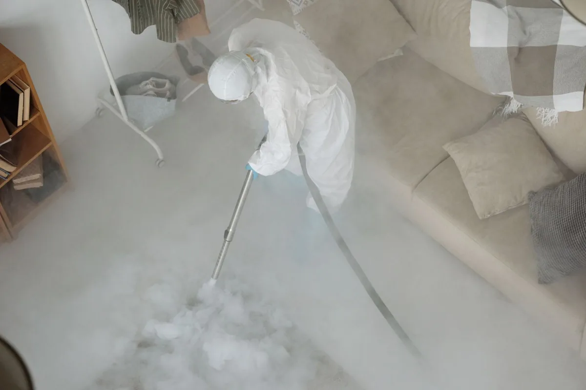 Biohazard cleanup technician in protective equipment, Salem, OR